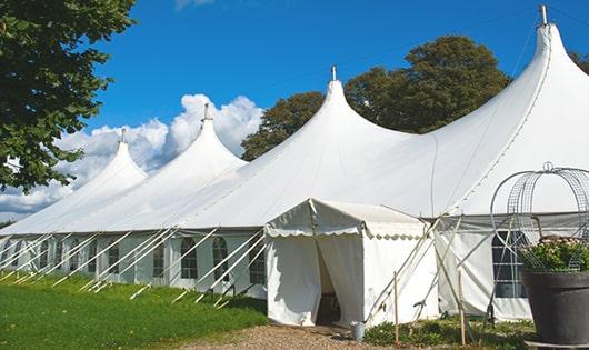 a line of sleek and modern portable restrooms ready for use at an upscale corporate event in Johnsonville, NY